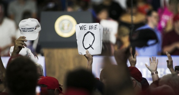 What is QAnon The Baseless Conspiracy Spilling into US Politics 